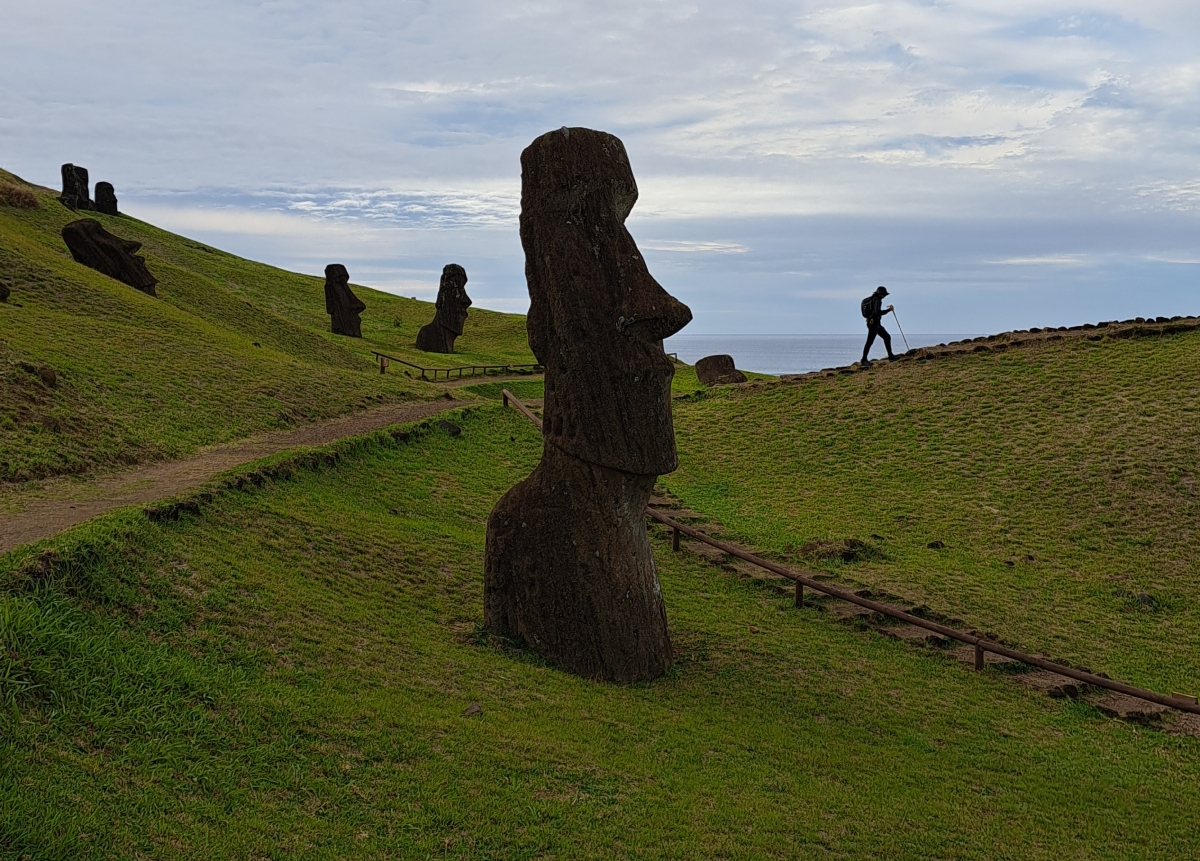 Digital art of a moai statue against a dramatic background